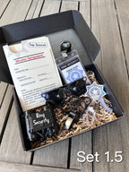 open box, set 1.5 includes a ring security "mission assignment" card with a ring security agent id badge, sunglasses, play binoculars, agent earpiece, black whistle, "ring security" sticker. the inside of the box is filled with Kraft colored paper filler.