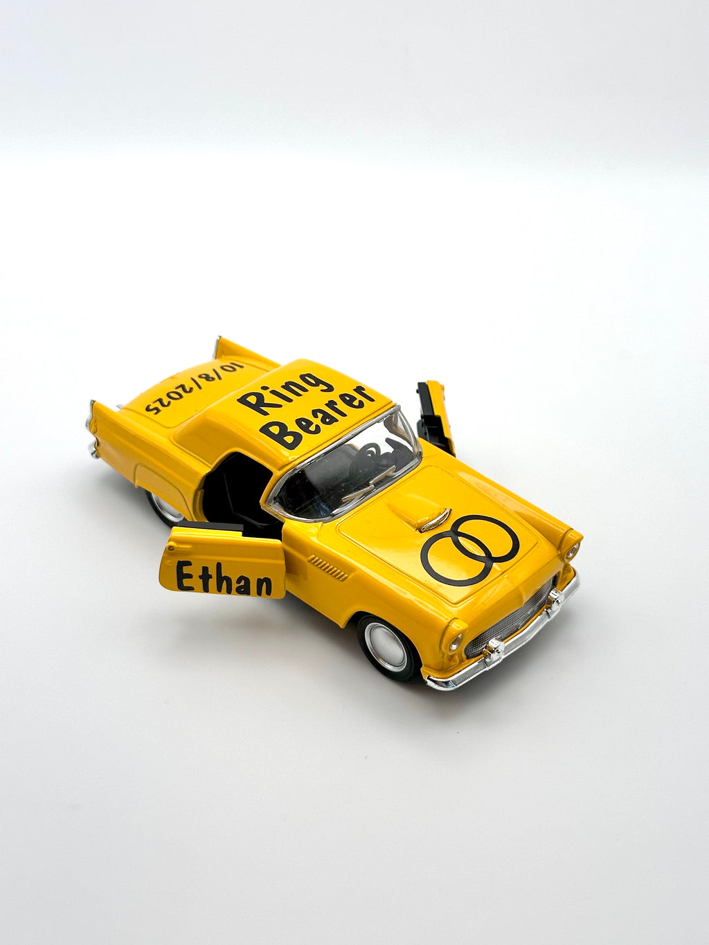 personalized ring bearer yellow car, ages 3+, die-cast car for ring security, not a toy, wedding boy memento. personalized with black premium vinyl, ring design on the hood, title on the top and name on the doors, date on the back of the car.