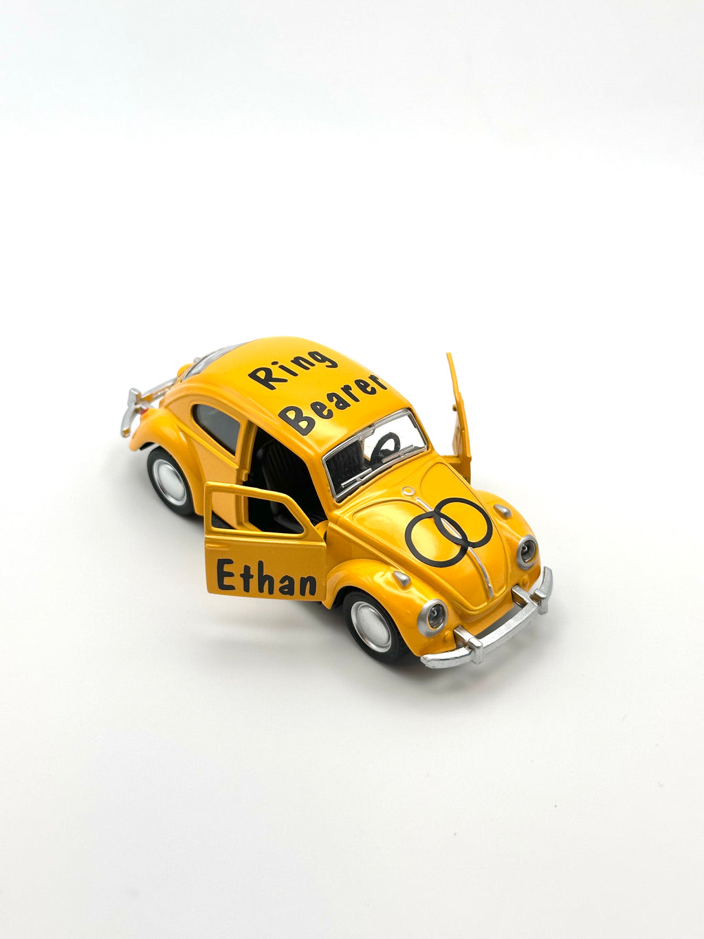 personalized ring bearer yellow car, ages 3+, die-cast car for ring security, not a toy, wedding boy memento. personalized with black premium vinyl, ring design on the hood, title on the top and name on the doors, date on the back of the car.